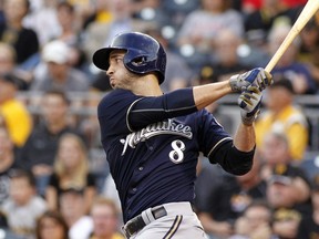 Ryan Braun #8 of the Milwaukee Brewers grounds out in the first inning scoring a run against the Pittsburgh Pirates during the game at PNC Park on September 10, 2015 in Pittsburgh, Pennsylvania.   Justin K. Aller/Getty Images/AFP
== FOR NEWSPAPERS, INTERNET, TELCOS & TELEVISION USE ONLY ==