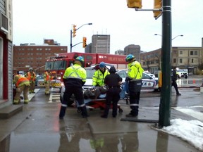Multiple people were injured after two vehicles collided in the intersection of Horton and Wellington streets shortly after 2:30 p.m. Sunday.  MARY JANE EGAN / THE LONDON FREE PRESS