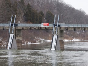 Water flows through the Springbank Dam in Springbank Park. (CRAIG GLOVER, The London Free Press)