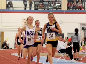Laurentian Voyageurs' Katie Wismer (right) and Marissa Lobert (middle) compete in the 1,500 metres at the York Open Indoor Track Meet at York University in Toronto on the weekend.