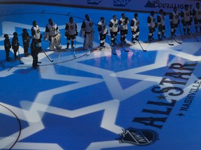 Eastern Conference players line up after being introduced at the NHL All-Star game in Nashville Sunday (Mark Zaleski/AP)