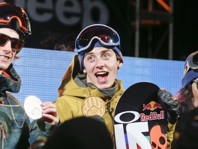 Max Parrot of Canada takes 2nd place, Mark McMorris of Canada (centre) takes 1st place during the Winter X Games America's Navy Snowboard Big Air on January 23, 2015 in Aspen, Colorado.   Nathan Bilow/Agence Zoom/Getty Images/AFP