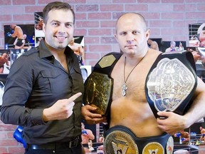 Author Chris Olech (Left) is pictured in St. Louis with the legendary Fedor Emelianenko, one of the many fighters who appear in his new book, The Fighter Within. (PHOTO BY HECTOR QUINTERO)