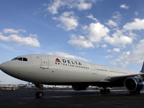 A Delta Airlines plane is seen in this Jan.  2, 2013, file photo. REUTERS/Jeff Haynes/Files