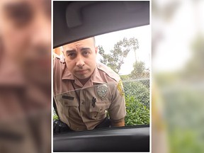 A woman in Miami pulled over a police officer to question him about his alleged speeding on Friday. (YouTube screenshot)