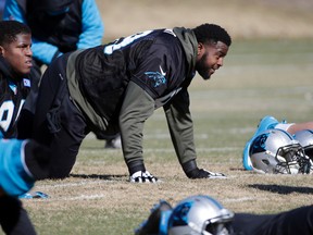 Carolina Panthers defensive tackle Kawann Short stretches during practice in advance of the NFC Championship game against the Arizona Cardinals in Charlotte, N.C., on Jan. 21, 2016. (AP Photo/Chuck Burton)