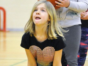 It may be unorthodox, but the method of free throw shooting worked for Joy Belfour. ANDY BADER/MITCHELL ADVOCATE