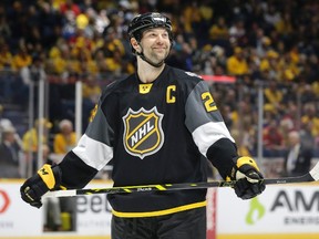 Pacific Division forward John Scott looks into the stands during the NHL All-Star Game against the Atlantic Division at Bridgestone Arena in Nashville on Jan. 31, 2016. (AP Photo/Mark Humphrey)