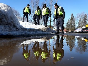 Ottawa police search for evidence near Shifa Restaurant in Ottawa Monday Feb 1, 2016. A police investigation was taking place Monday morning after a murder at the restaurant Sunday night.  Tony Caldwell/Postmedia Network.