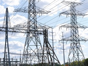 Power lines and pylons stretch across the city of  Toronto , east-to-west, along the power corridor adjacent to the Leaside Transformer Station off of Millwood Ave.  on Tuesday July 21, 2015. Jack Boland/Toronto Sun/Postmedia Network