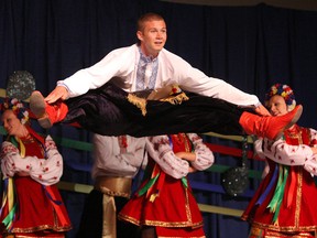 Members of the Selo Ukrainian Dancers of Anola perform the Hopak dance at the Ukraine-Kyiv Pavilion at Maples Collegiate as part of Folklorama.