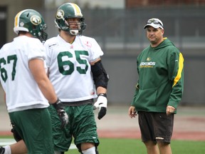 Eskimos coach Tim Prinsen, shown here as an O-line coach with the team in 2012, will be the running backs coach in the upcoming season. (File)