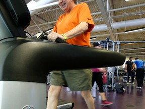 63-year-old heart attack survivor Doug Hunter works out at the Clairview Community Recreation Centre on Monday Feb. 1, 2016. Alberta Health Services (AHS) held a press conference about a new pilot program that helps heart patients turn rehabilitation into life-long exercise habits. Tom Braid/Postmedia Network