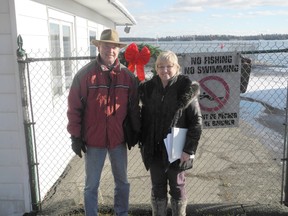 Brian Phillips and Wendy Merkley by the Customs House property in Rockport.