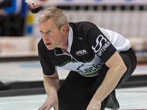 Joe Frans watches his rock during his team's 6-3 loss to Mark Bice in the first draw of the 2016 Ontario men's Tankard in Brantford on Feb. 1, 2016. (BRIAN THOMPSON/Postmedia Network)