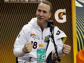 Denver Broncos' Peyton Manning answers a question during Opening Night for the NFL Super Bowl 50 football game Monday, Feb. 1, 2016, in San Jose, Calif. (AP Photo/David J. Phillip)