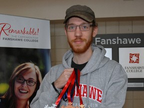 Fanshawe College St. Thomas-Elgin Regional Campus student Josh Taylor shows off the custom-designed medals he created for the 2016 World Tubing Championships on Feb. 12 and 13. The mechanical technician student spent days outside of class time designing the prototype and manufactured the plastic prizes using a 3D printer.