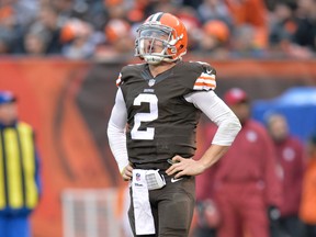 In this Dec. 14, 2014, file photo, Cleveland Browns quarterback Johnny Manziel reacts after being sacked in the third quarter of an NFL football game against the Cincinnati Bengals, in Cleveland. Troubled Browns quarterback Johnny Manziel was cited for driving with expired license plates last weekend. According to police in North Olmsted, Ohio, Manziel was stopped at 8:28 a.m. on Saturday, Jan. 3, 2016, while driving on Interstate 480  (AP Photo/David Richard, File)