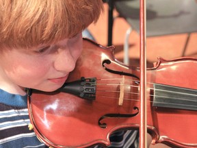 Max is one of the children benefitting from the El Sistema music learning program.