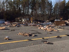Debris is scattered across the former site of Law & Orders burger joint on Highway 7 at Innisville, west of Carleton Place, the result of an overnight explosion and fire. (Blair Crawford)
