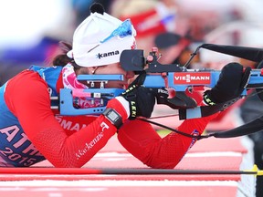 Team Canada's Rosanna Crawford of Canmore shoots on the range during training for the BMW IBU World Cup Biathalon at the Canmore Nordic Centre on Feb. 2, 2016. (Ted Rhodes/Postmedia)