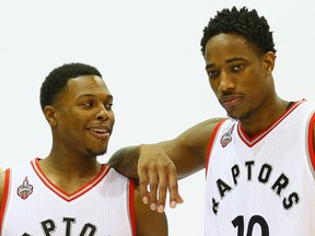 Kyle Lowry and DeMar DeRozan pose during media day as the Raptors start their pre-season at the Air Canada Centre in Toronto on Sept. 28, 2015. (Dave Abel/Toronto Sun/Postmedia Network)
