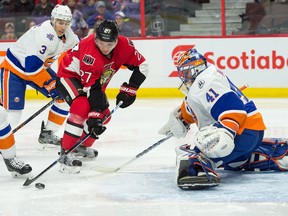 Ottawa Senators winger Curtis Lazar (27) shoots on New York Islanders goalie Jaroslav Halak (41) during NHL play at the Canadian Tire Centre in Ottawa. (Marc DesRosiers/USA TODAY Sports)