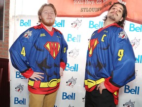 Patrick Murphy, left, and Danny Desrochers, of the Sudbury Wolves, model superhero jerseys the team will wear against the Saginaw Spirit at Superhero Night on February. 12 at the Sudbury Community Arena in Sudbury, Ont. The Wolves held a press conference on Tuesday February 2, 2016 to announce details of their charity double-header weekend.
