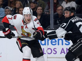 Los Angeles Kings defenceman Alec Martinez (right) tries to hold up Ottawa Senators centre Kyle Turris at Staples Center in Los Angeles. (Jayne Kamin-Oncea/USA TODAY Sports)