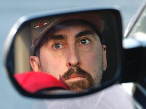Alberta oil worker Jason Lawrence sits in his vehicle in Calgary, Alberta on Tuesday Feb. 2, 2016. Prime Minister Justin Trudeau arrives in Alberta this week with oil prices in the gutter, unemployment on the rise, and many in the oilpatch concerned for their future. THE CANADIAN PRESS/Larry MacDougal