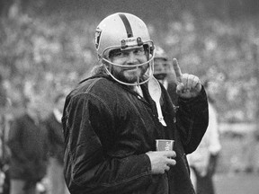 In this Dec. 27, 1976, file photo, Oakland Raiders quarterback Ken Stabler stands on the sidelines during the second half of AFC championship game against the Pittsburgh Steelers in Oakland, Calif. Boston researchers say Stabler had the brain disease CTE. Boston University confirmed the diagnosis Wednesday, Feb. 3, 2016. (AP Photo/File)