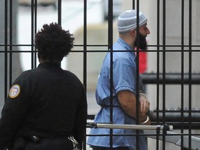 Adnan Syed enters Courthouse East in Baltimore prior to a hearing on Wednesday, Feb. 3, 2016 in Baltimore. The hearing, scheduled to last three days before Baltimore Circuit Judge Martin Welch, is meant to determine whether Syed's conviction will be overturned and case retried. (Barbara Haddock Taylor/The Baltimore Sun via AP)