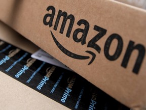 Amazon boxes are seen stacked for delivery in the Manhattan borough of New York City, January 29, 2016. REUTERS/Mike Segar