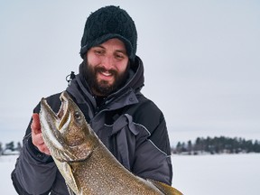 Eric Riley of Ottawa with a new personal-best lake trout. (Ashley Rae photo)