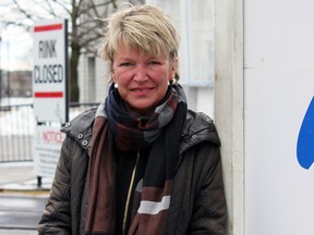 Michele Langlois, general manager and director of marketing of Downtown Kingston!, at Springer Market Square on a dreary Wednesday. (Steph Crosier/The Whig-Standard)