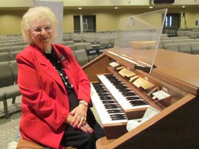 Dorothy Dunne sits on Wednesday February 3, 2016 at the organ at Bethel Pentecostal Church in Sarnia, Ont., where she has been the organist for 60 years. (Paul Morden, The Observer)