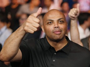 In this May 2, 2015, file photo, Charles Barkley joins the crowd before the start of the world welterweight championship bout between Floyd Mayweather Jr., and Manny Pacquiao in Las Vegas. (THE CANADIAN PRESS/AP/John Locher, File)