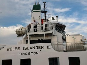 Supplied Photo
Brian Johnson stands on the bridge wing of the refurbished Wolfe Islander III, departing Hamilton for Kingston on Nov. 7, 2015.