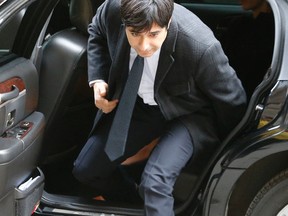 Jian Ghomeshi arrives for the continuation of his trial at Old City Hall court in Toronto on Thursday February 4, 2016. (Michael Peake/Toronto Sun)