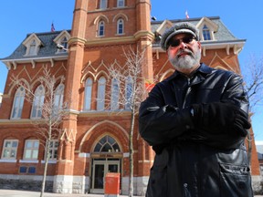 TIM MIller/The Intelligencer
Rev. David Mundy stands in front of Belleville's city hall Thursday. Mundy, representing several local churches, has been denied the opportunity to speak in front of council in regards to concerns arising from the approval of a new casino.