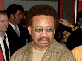 In this July 7, 2003 file photo, Maurice White, of Earth, Wind, & Fire, appears at an induction ceremony at the Hollywood Rock Walk in the Hollywood section of Los Angeles. White, the founder and leader of Earth, Wind & Fire, died at home in Los Angeles, Wednesday, Feb. 3, 2016, said his brother, Verdine White. He was 74.  (AP Photo/Matt Sayles, File)