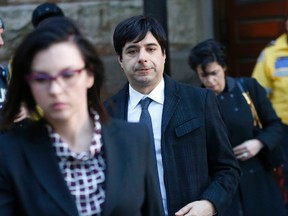 Jian Ghomeshi leaves court after Day 3 of his trial at Old City Hall court in Toronto on Thursday, February 4, 2016. Michael Peake/Toronto Sun/Postmedia Network