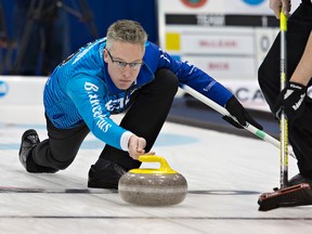 Greg Balsdon, skip of the Cataraqui Golf and Country Club team, delivers a rock during a game against Toronto's Mike Harris at the Ontario Tankard at the Wayne Gretzky Sports Centre in Brantford on Thursday. Balsdon won 8-3. (Brian Thompson/Postmedia Network)
