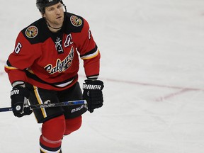 Dennis Wideman of Flames was suspended for 20 games by the NHL after hitting an official.