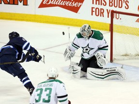 Winnipeg Jets centre Andrew Copp (9) is stopped on a breakaway by Dallas Stars goalie Antti Niemi (31) on Tuesday. The Jets believe they were a couple of buried chances away from winning a game that they wound up losing 5-3.