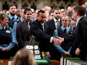 Samearn Son, shown here, is among those being honoured by the Governor General for bravery on Oct. 22, 2014, when a gunman stormed Parliament Hill.