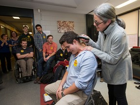 As part of World Cancer Day, Carleton University student Josh Nadler invited his grandmother Carol Aronson to do something she hasn't done in years; cut his hair.  Only this time she left him bald, just like he asked her to as part of his effort to raise a little over $1,800 for cancer research. With Carol being a breast cancer survivor and the father of a close friend of Josh's recently being diagnosed with cancer Josh decided to show whatever support he could.  Assignment - 122802 (Wayne Cuddington)
