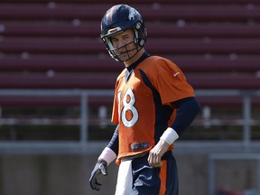 Denver Broncos quarterback Peyton Manning stands on the field during practice in Stanford, Calif., on Feb. 4, 2016. (AP Photo/Jeff Chiu)