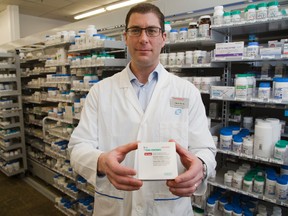 Pharmacist Drew Peddie with fentanyl patches at Shoppers Drug Mart in St. Thomas, Ont. on Friday February 5, 2016. (DEREK RUTTAN, The London Free Press)