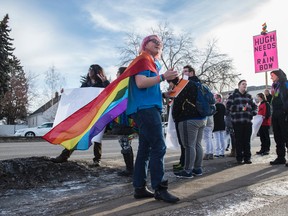 EDMONTON, AB. FEBRUARY 5, 2016 - Dylan Chevalier, a grade 11 student at St. Joseph High School and the Students Union VP, was told by a teacher to remove his rainbow flag cape at a school procession yesterday. Today Dylan and about 20 supporters rallied outside the school at lunchtime to support LGBQT students. Photo by Shaughn Butts. POSTMEDIA NETWORK